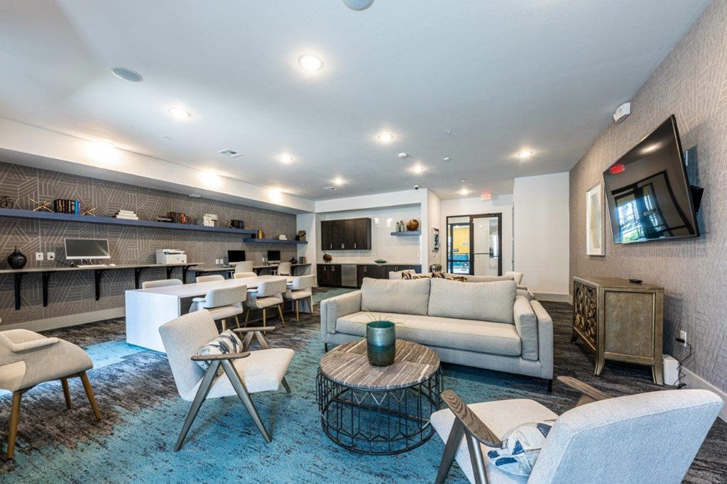 Cromwell at Plum Creek Apartments Clubhouse Seating Area with Television and Computer