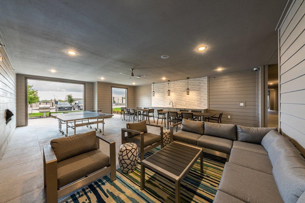 Cromwell at Plum Creek Apartments Clubhouse with Seating and Ping Pong Table