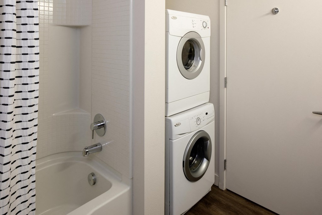 Savier Street Flats Model Bathroom with Washer and Dryer