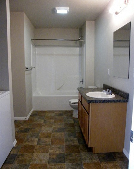 Ashlyn Place Apartments Bathroom Sink and Shower