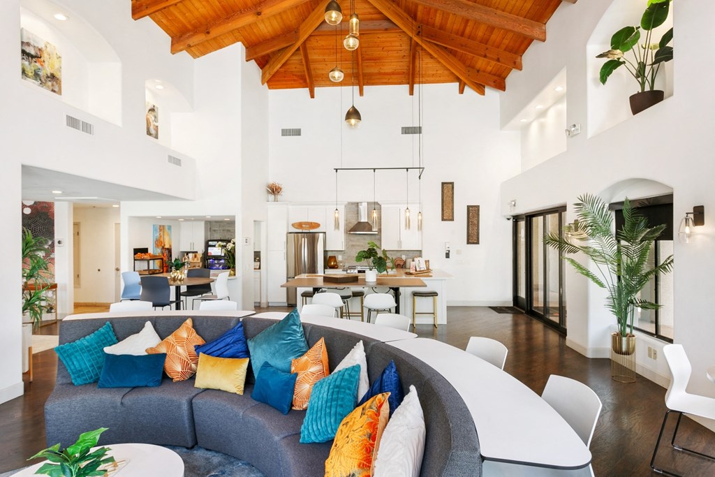 San Melia Apartments lounge seating area with wood ceiling