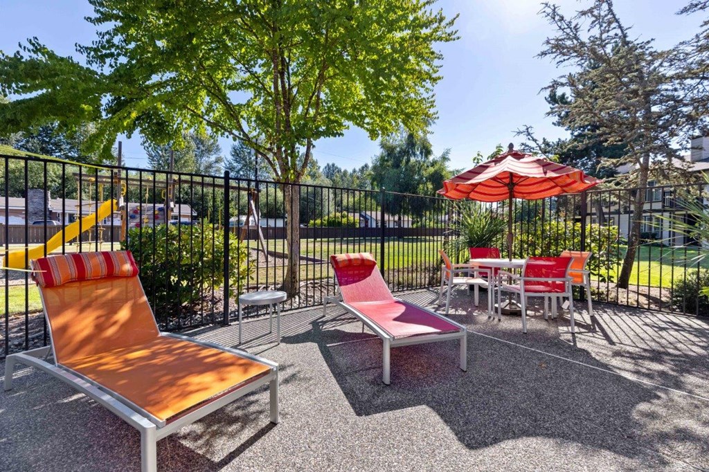 Saratoga Apartments in Everett, Washington Patio with Lounge Chairs