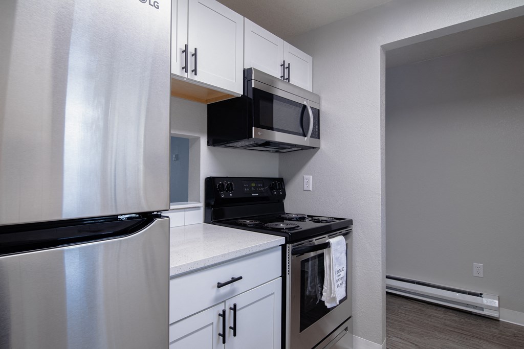 Shannon South Apartments kitchen with white cabinets