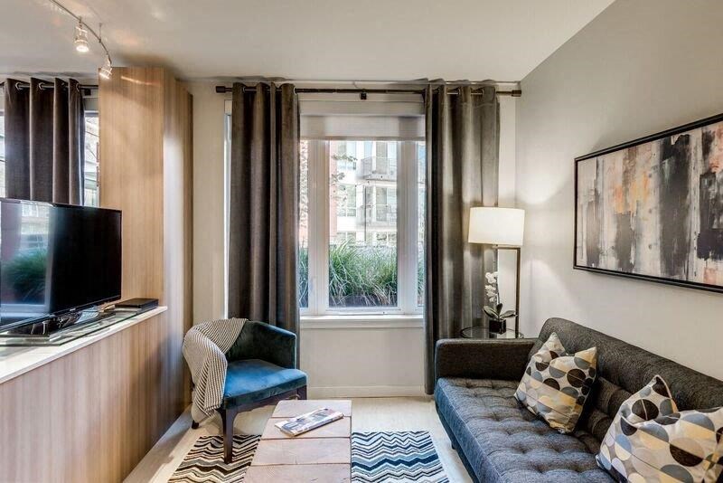 a living room with a couch and a television