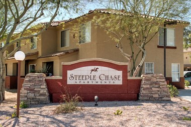 Steeple Chase Apartments Sign and Apartment Building