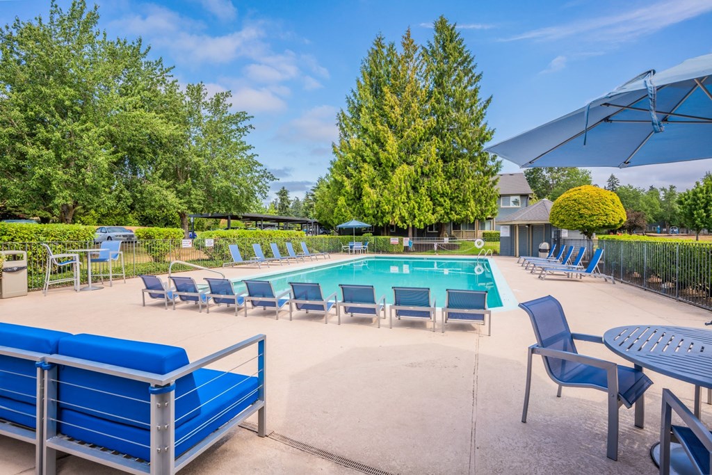 Stonesthrow Apartments Pool with Lounge Chairs
