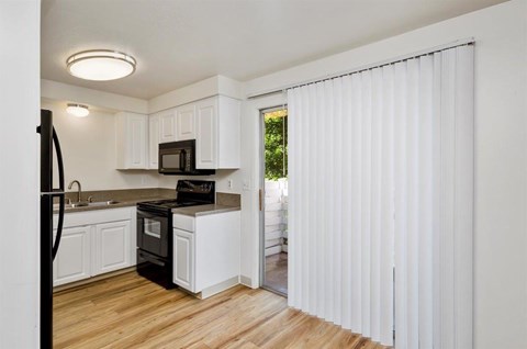 Sugar Pine Apartments in Boise, Idaho Dining Room and Kitchen with Private Patio