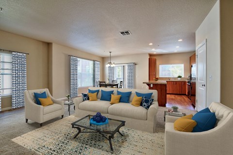 a living room with a couch and a table