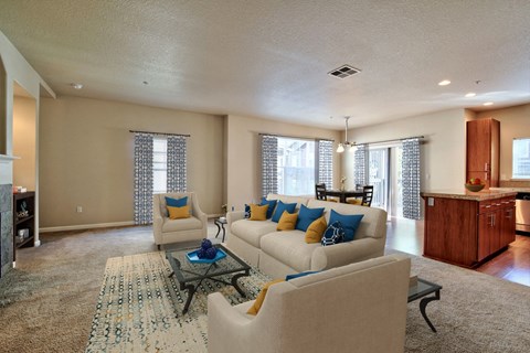 a living room with a couch and a table