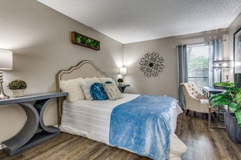 The Retreat at River Ranch Large Bedroom with Hardwood Floors Property Image