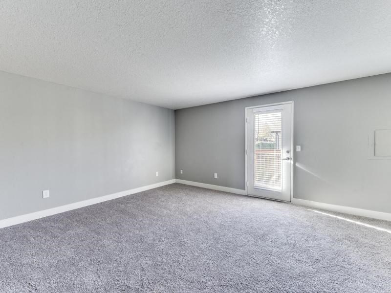 The Acres Living Room with Private Patio