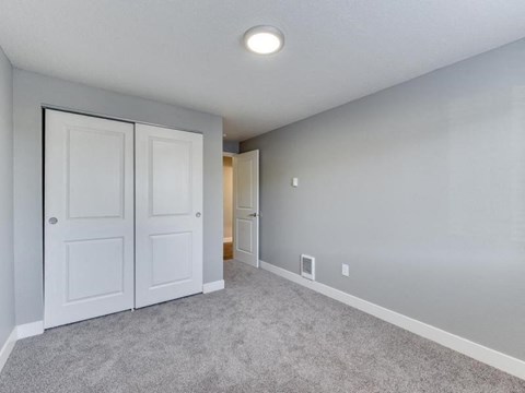 The Acres Bedroom with Carpet