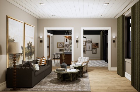 A living room with a brown couch and a coffee table.