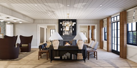 A modern living room with a fireplace and a large brown sofa.