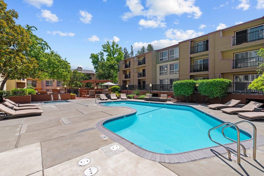 The Crest Pleasant Hill Apartments in California Pool with Lounge Chairs