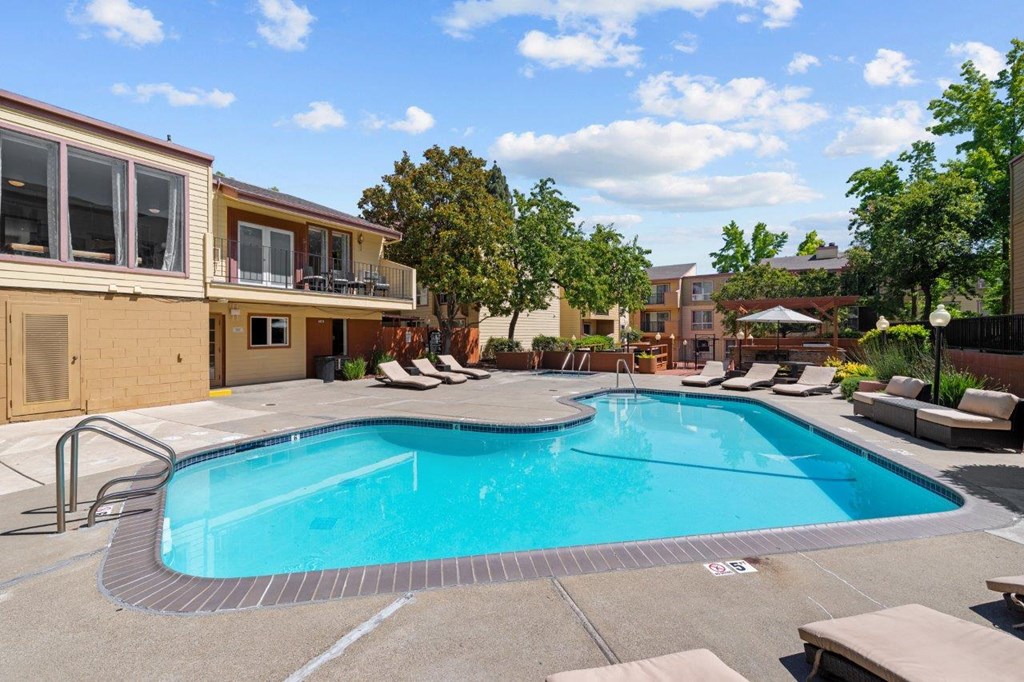 The Crest Pleasant Hill Apartments in California Pool with Lounge Chairs