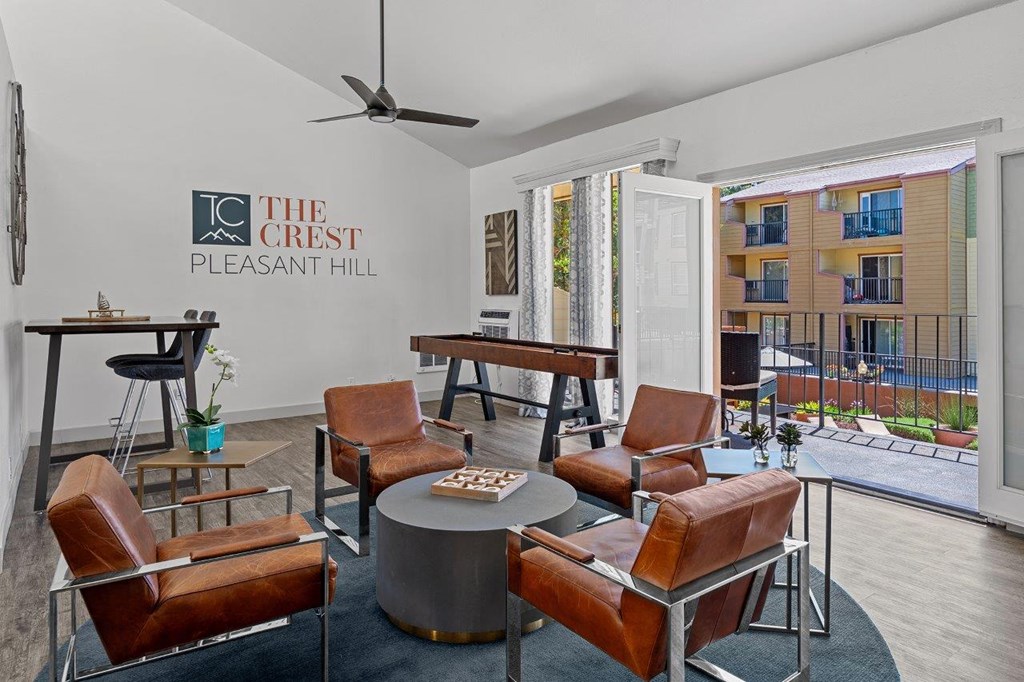 The Crest Pleasant Hill Apartments in California Clubhouse Lounge with Shuffleboard and Patio