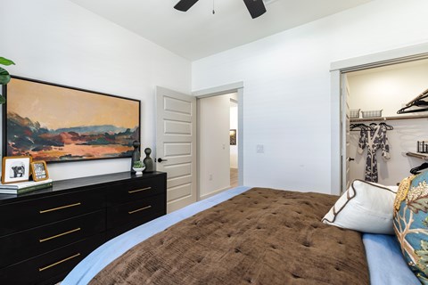 The Depot Apartments in Celina, Texas Bedroom with Attached Walk-In Closet