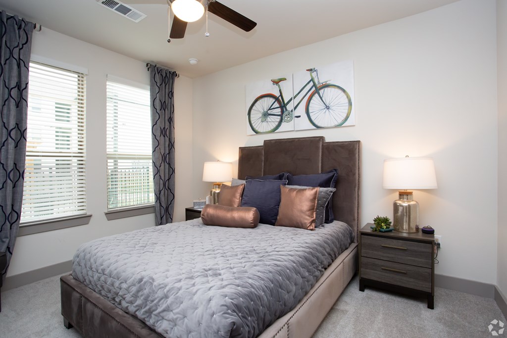 The Flats at Shadowglen Apartments in Manor, TX Model Bedroom