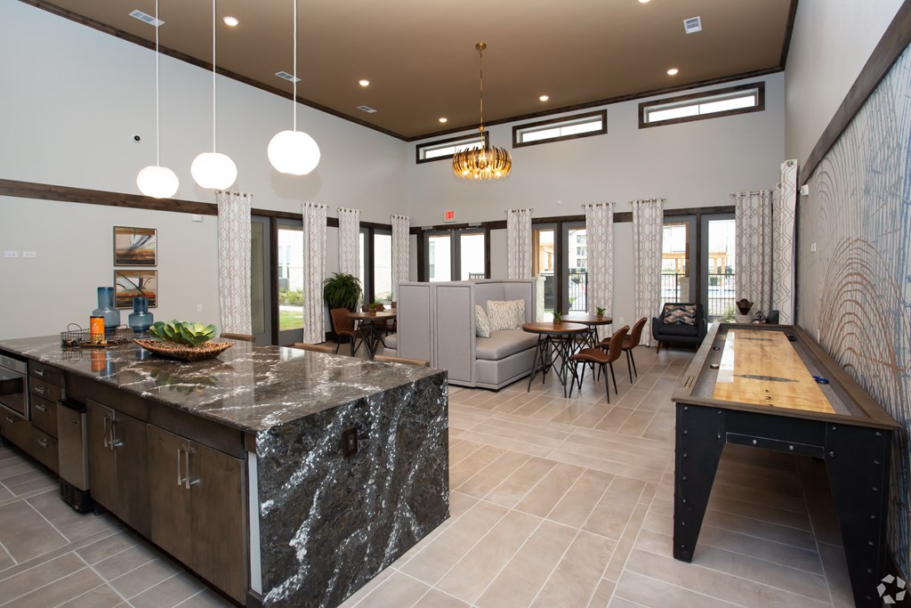 The Flats at Shadowglen Apartments in Manor, TX Clubhouse Lounge