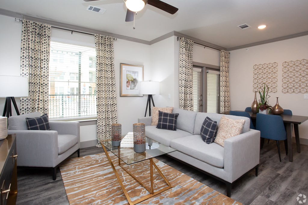 The Flats at Shadowglen Apartments in Manor, TX Model Living Room