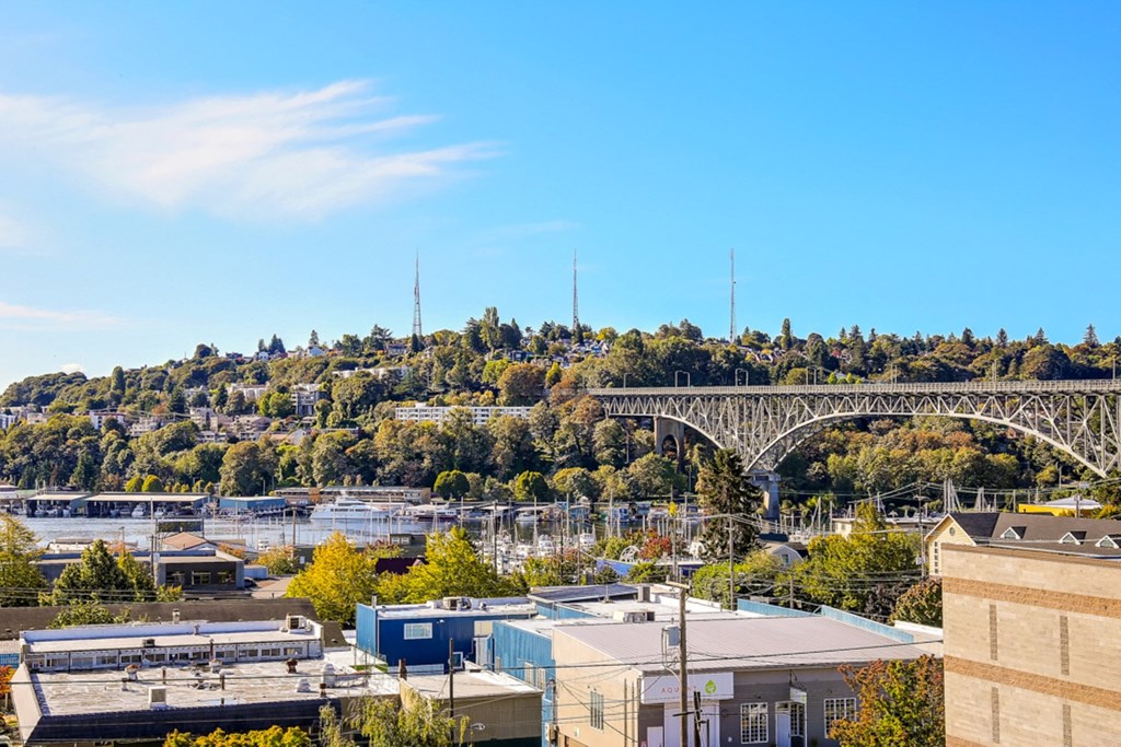The Hayes on Stone Way Apartments view of the city with a bridge over the water and buildings