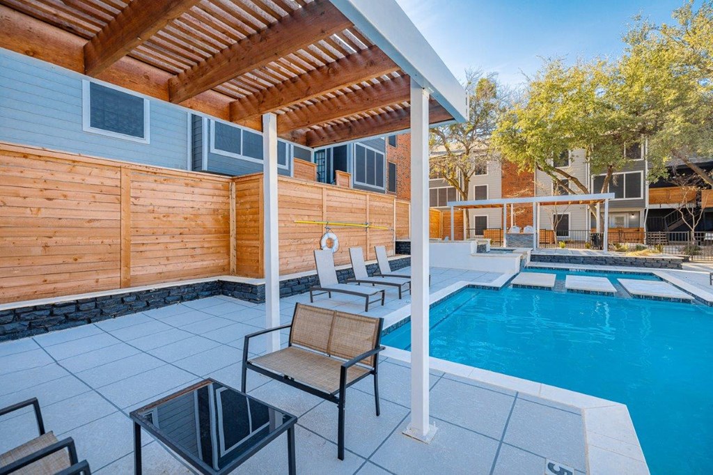 The Monet Apartments in Dallas, Texas Pool with Lounge Chairs