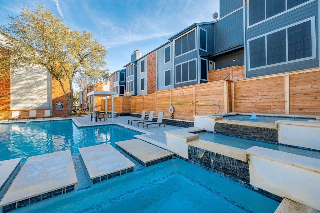 The Monet Apartments in Dallas, Texas Pool with Lounge Chairs