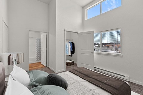 Bedroom with vaulted ceiling and walk-in closet at The Northern at Coeur dAlene Place Apartments, Coeur dAlene, 83815