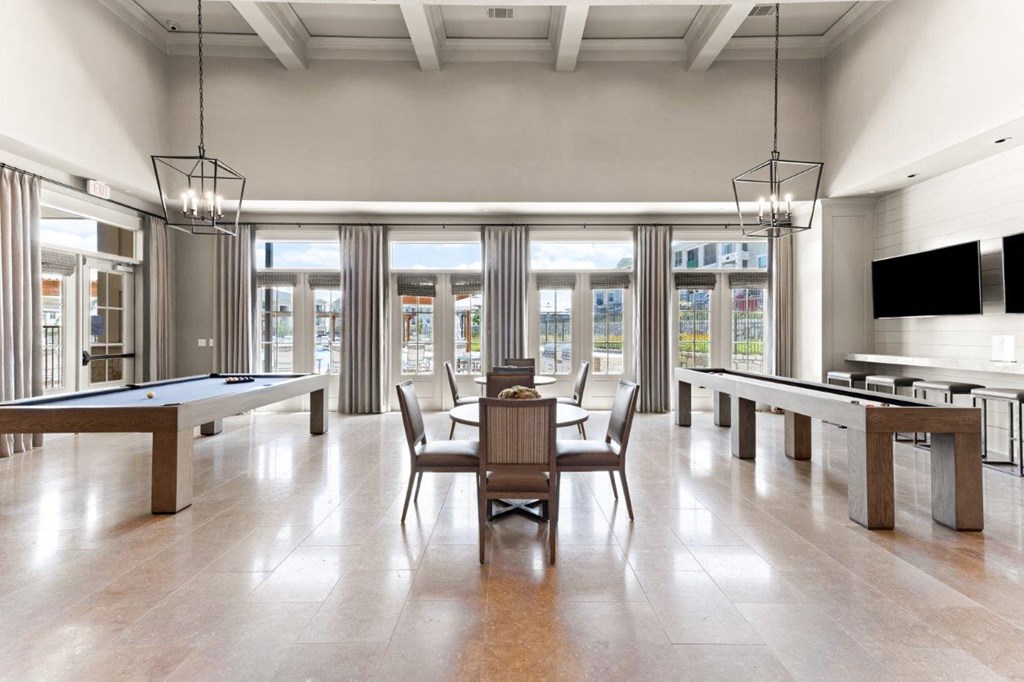 The Southbrook Apartments in Leander, Texas Clubhouse Lounge with Pool Table and Shuffleboard