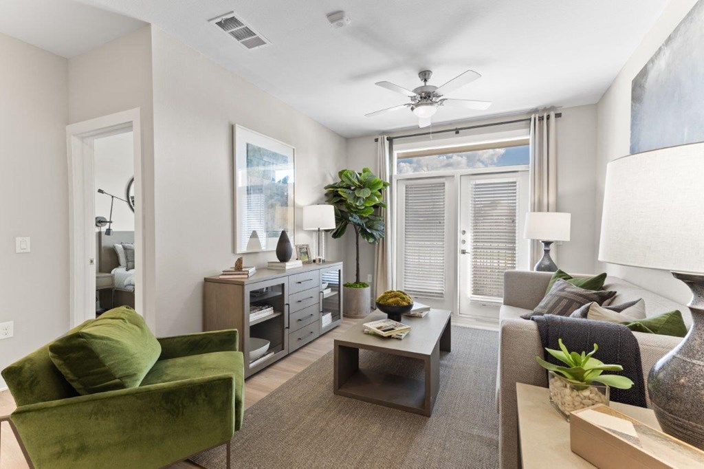 The Southbrook Apartments in Leander, Texas Model Living Room with Private Patio