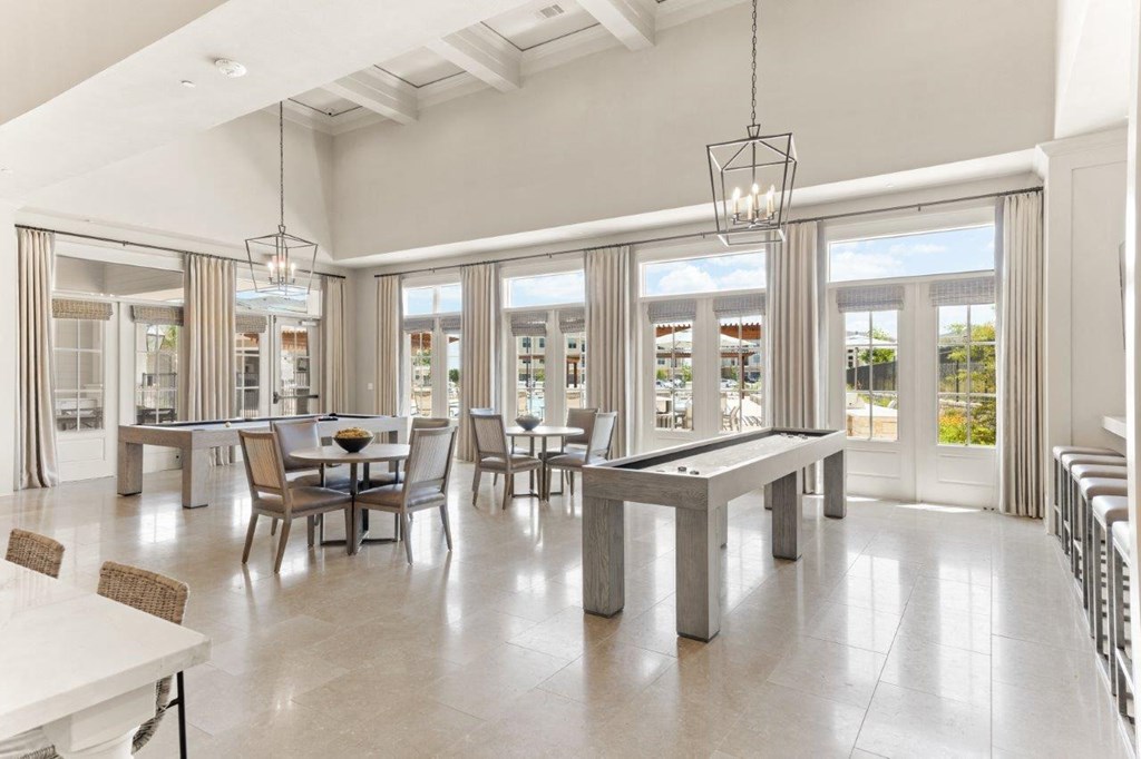 The Southbrook Apartments in Leander, Texas Clubhouse Lounge with Shuffleboard