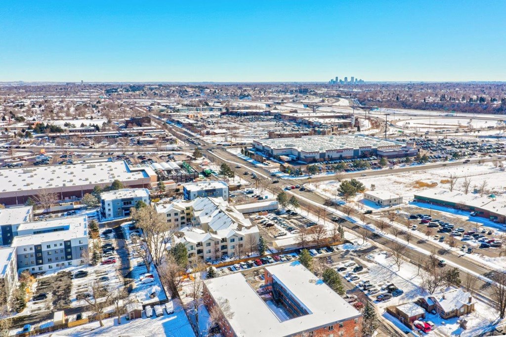 The Village at Arvada Aerial View and View of Downtown Denver