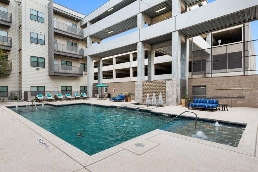 The Wall Street Lofts in Midland, Texas Pool with Lounge Chairs
