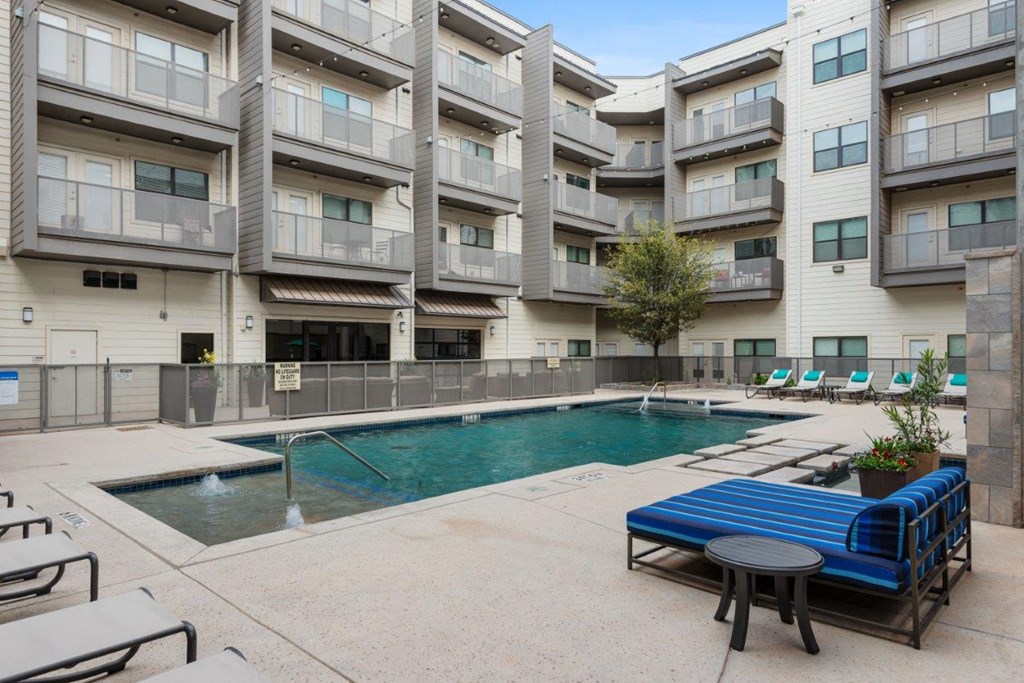 The Wall Street Lofts in Midland, Texas Pool with Lounge Chairs