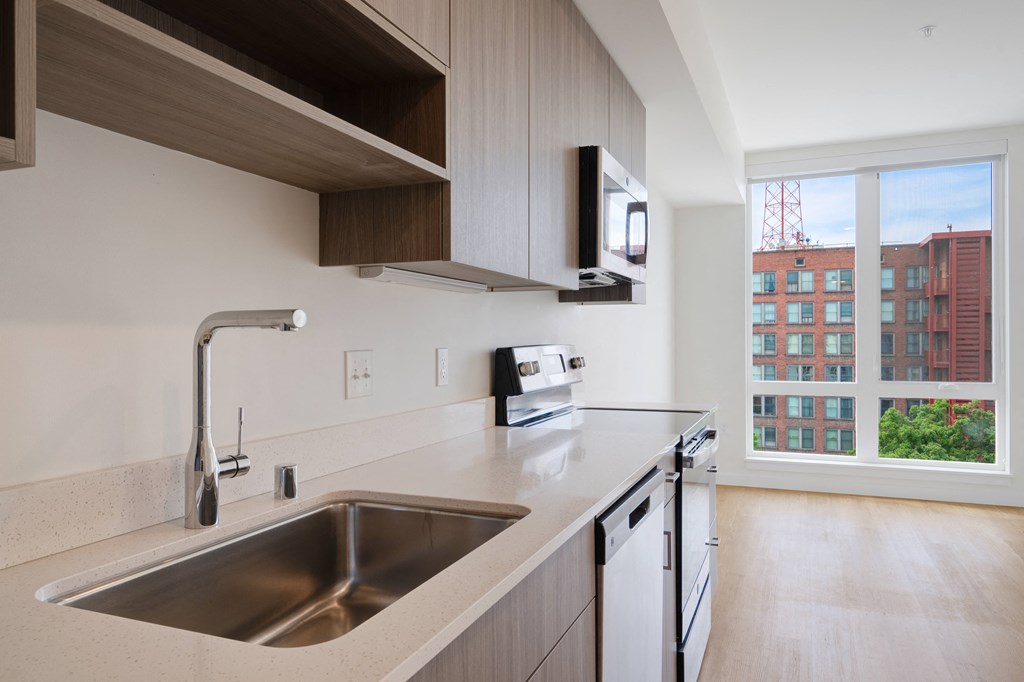 The Warren Apartments kitchen and stainless steel appliances
