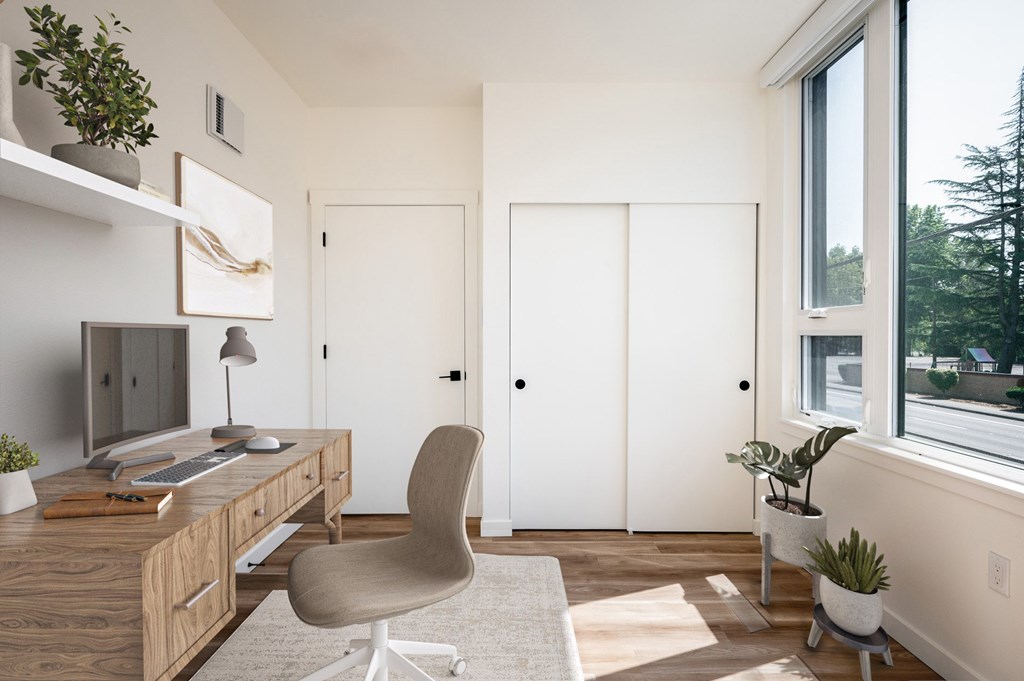 The Wes Gresham Oregon Apartments A room with a desk, chair, and a window.