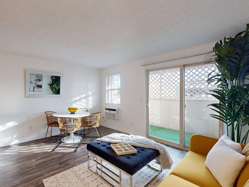 a living room with a and a table with two chairs