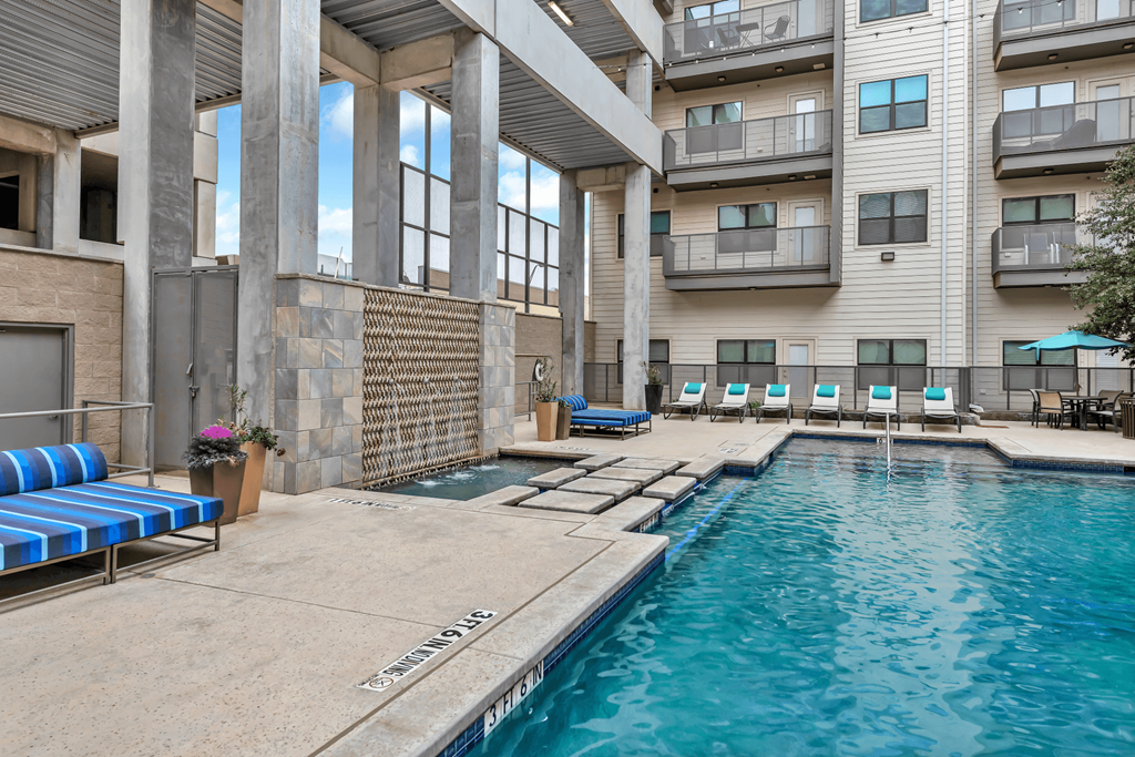 The Wall Street Lofts in Midland, Texas Pool with Lounge Chairs