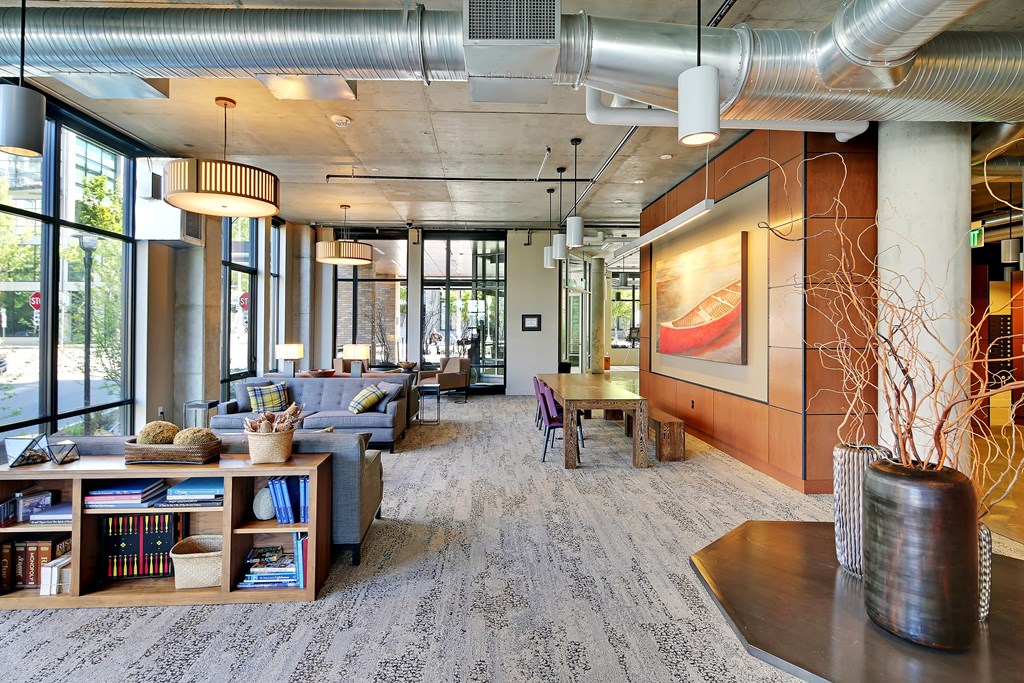 a large room with couches and tables