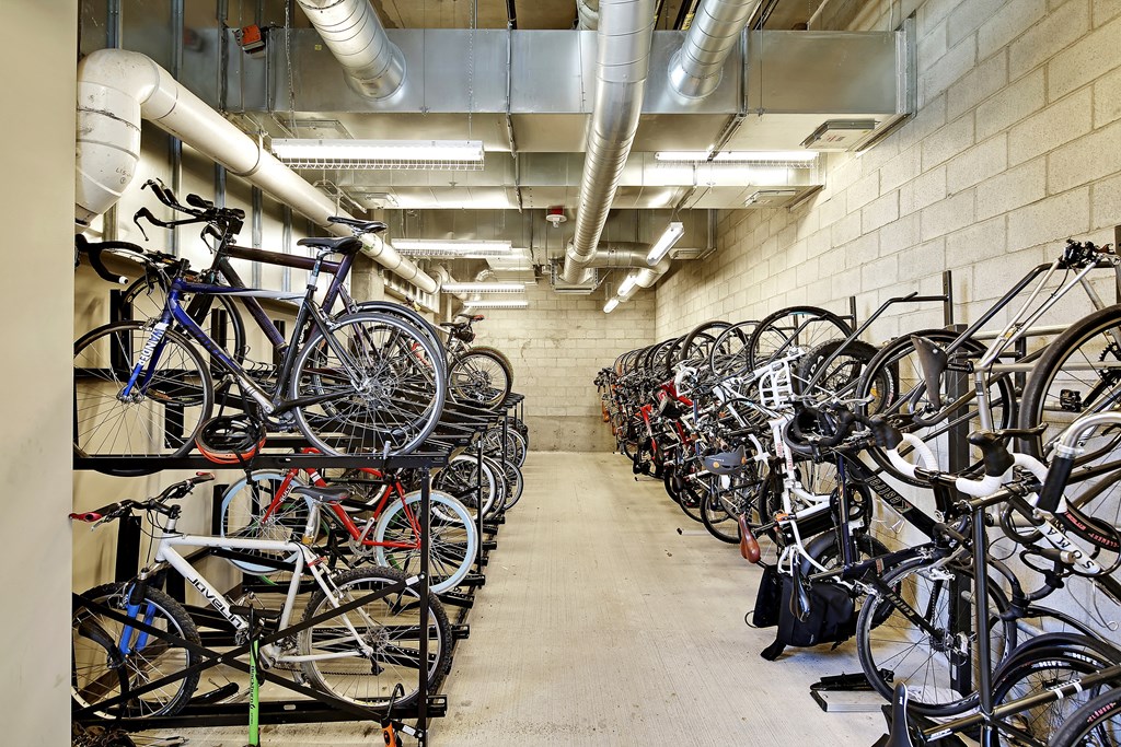 a room filled with lots of bikes sitting on top of each other