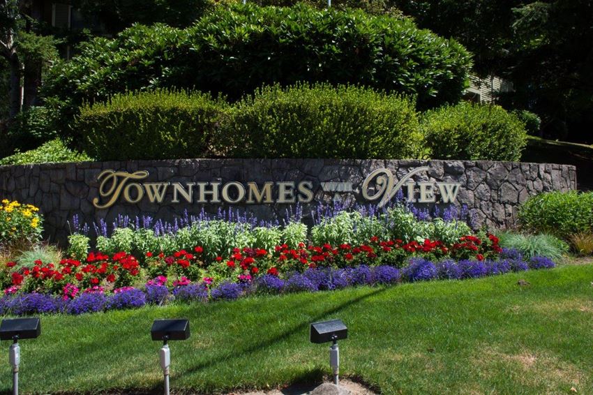 Townhomes with a View Exterior Monument Sign and Landscaping - Photo Gallery 1