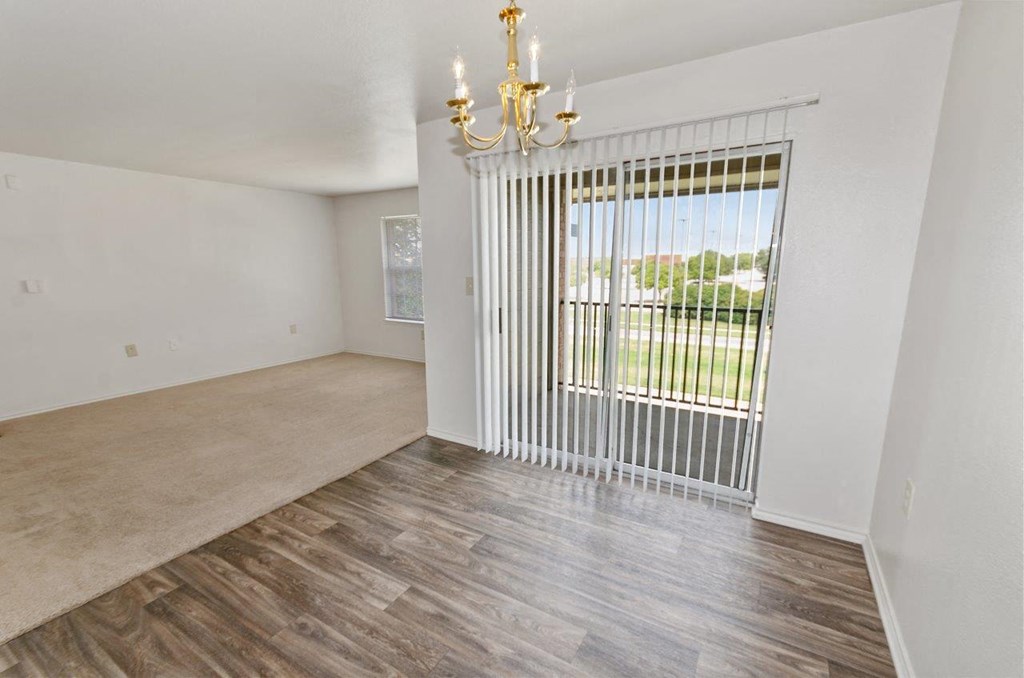 Valley Ridge Apartments in Lewisville, Texas Dining Room with Private Patio and Living Room