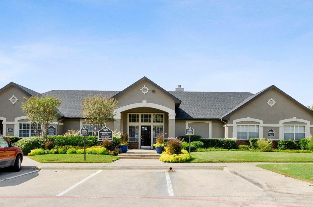 Valley Trails Apartments in Irving, Texas Clubhouse Exterior and Parking