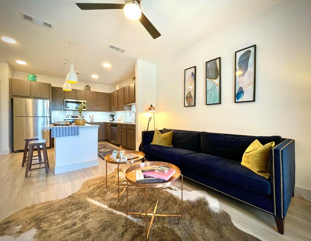 Valor at the Realm in Lewisville, Texas Model Living Room and Kitchen with Island