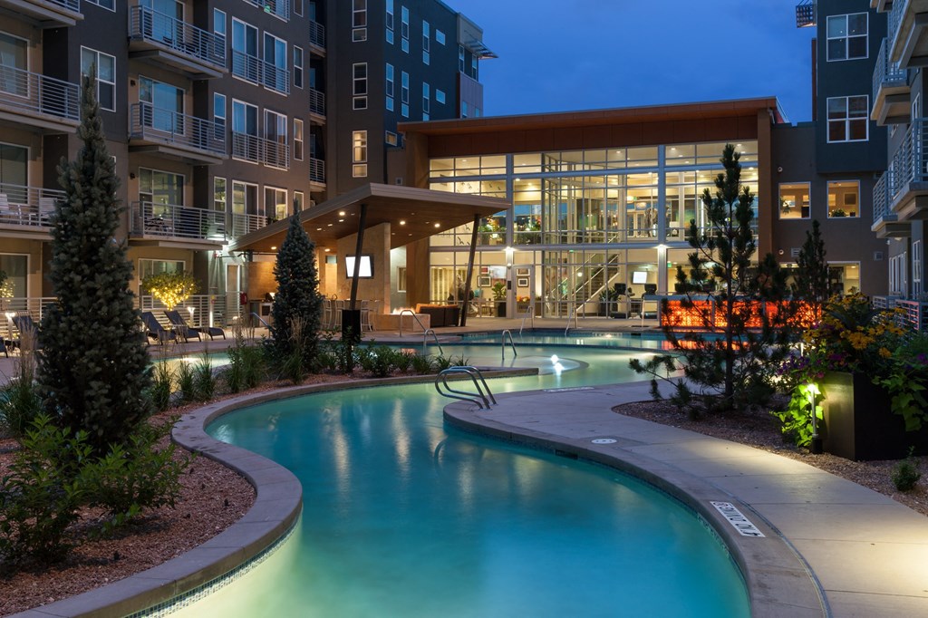 Veranda Highpointe Apartments Lazy River and Buildings at Night