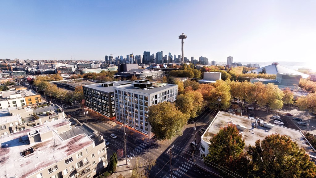 the city with the space needle in the background