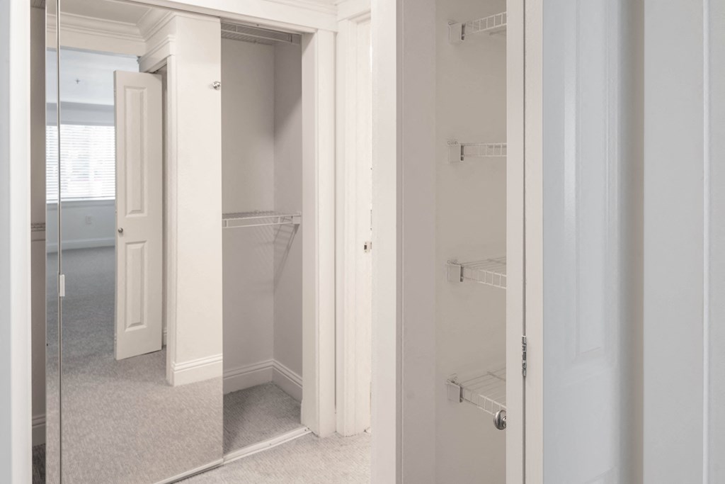 a walk in closet in a 555 waverly unit
