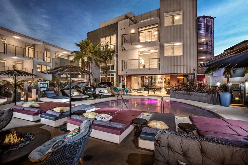 Vinz on Fairfax Apartments in Los Angeles, California Pool with Lounge Chairs at Dusk