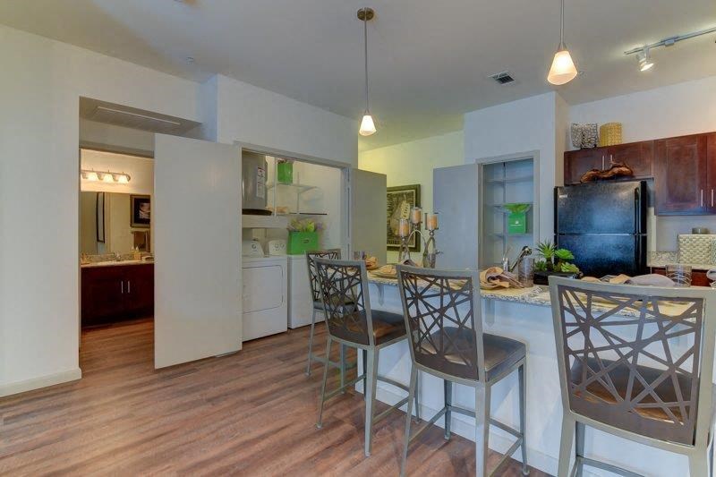 Volar Apartments Model Kitchen and Laundry Closet